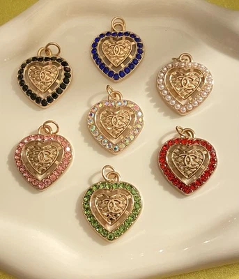 Lot Of 7 Chanel Zipper Pull Button Stamped Charms - Image 1 of 3