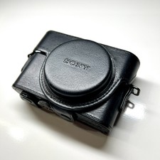 Sony Cyber-shot DSC-RX100 IV 20.1MP Digital Camera w/ Leather Case