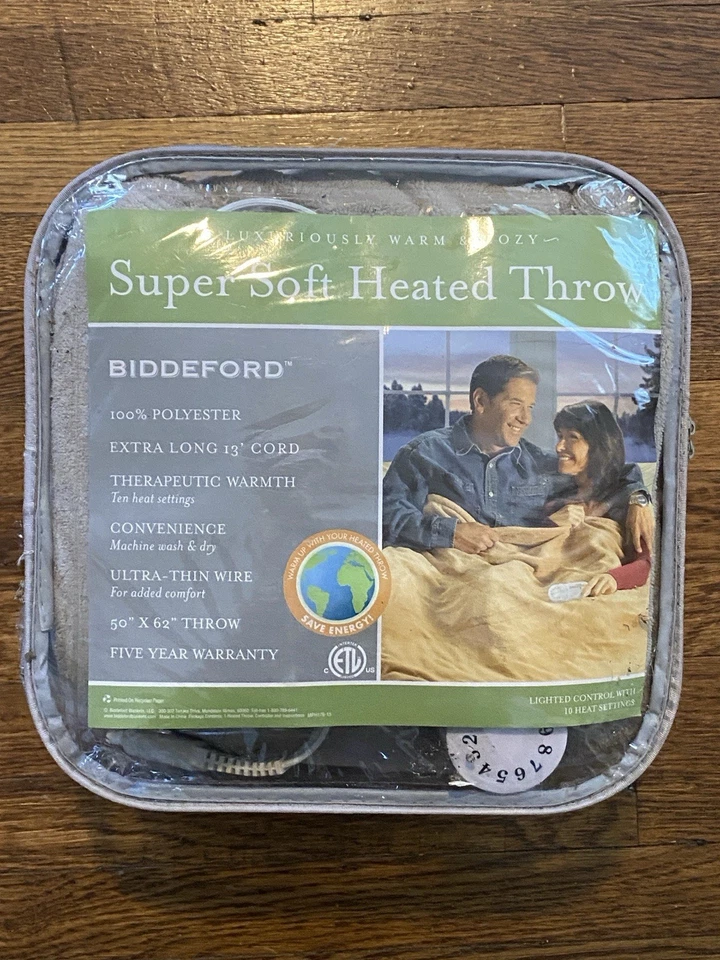 Manta eléctrica súper suave con calefacción lujosamente cálida y acogedora Foto 1 de 1