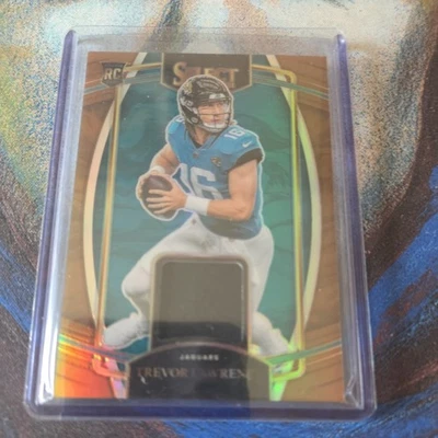 2021 Select Trevor Lawrence 34/49 Rookie Card Prizm Holo RC #RSW-TLR Patch Jags - Image 1 of 2