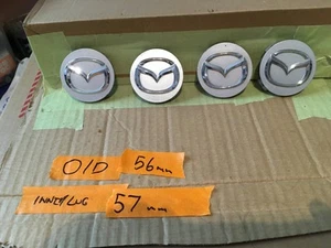 Mazda x4 factory alloy wheel hub cap genuine chrome/silver - Picture 1 of 1