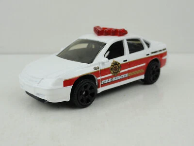 2009 Matchbox #58 Chevrolet Impala Fire Rescue (6-Spoke Wheels) - LOOSE - Image 1 of 4