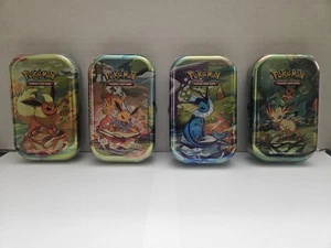 Pokemon Prismatic Evolutions Mini Tins Set of 4, Sealed - Picture 1 of 6