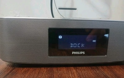 Base de altavoz Philips DC291/37 iPod/iPhone - Radio reloj FM/AM - plateada Foto 1 de 4