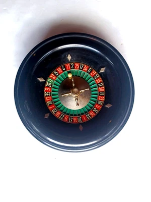 Ancienne  roulette casino en bakélite et métal - Photo 1/4