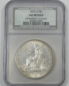 Dólar de plata NCS (NGC) genuino 1875-S detalles AU - Imagen 1 de 4