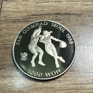 1986 Korea 1000 Won Olympic Games 1988 in Seoul - Picture 1 of 2