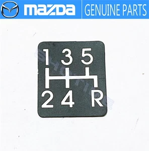 MAZDA 93-02 RX-7 FD3S 5MT 5 velocidades cambio perilla palanca cambio etiqueta adhesiva OEM - Imagen 1 de 2