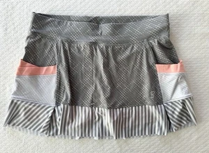 SOFIBELLA Tenis Golf Pickleball Falda Skort Mediana M FPS 50 Bolsillos Gris Melón - Imagen 1 de 6