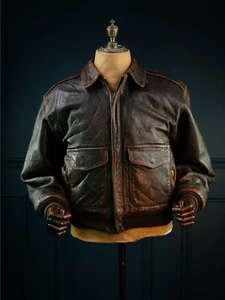 Chaqueta de cuero de vuelo de bombardero A2 estilo de oveja Avirex de colección de los 90 de piel de oveja “M” - Imagen 1 de 22
