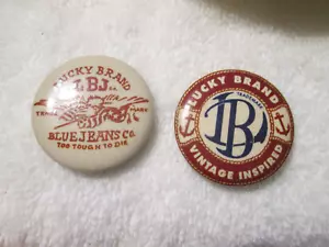 JEANS ADVERTISING METAL VINTAGE LUCKY BRAND Bottoni pinback - Foto 1 di 4