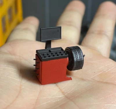 Máquina Equilibradora de Neumáticos Roja 1:64 Garaje Pantalla Escena Modelo Resina para Coche Foto 1 de 2