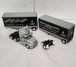 J.J. Keller DCP International 9100i With Twin 28' Wabash Pup Trailers 1:64 Scale - Picture 1 of 15
