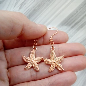 Starfish earrings rose gold tone dangles beach summer sealife womens jewellery - Picture 1 of 9