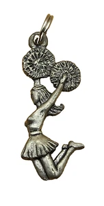 Animadora saltadora vintage con pompones tono plata encanto, pequeña 1", usada en excelente estado - Imagen 1 de 4