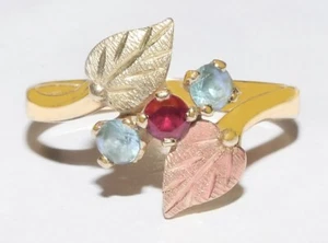 Black Hills Gold 10k Ruby Blue Topaz Two Leaves Ring Size 7 - Picture 1 of 5