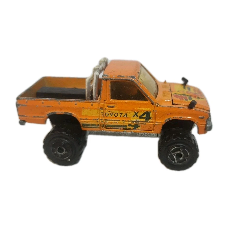 Camioneta pickup Majorette años 80 Toyota naranja 4x4 vintage diecast hecha en Francia Foto 1 de 4