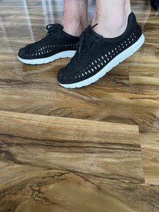black mayfly trainers