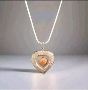 Platinum Plated Heart Pendant With Rhodium Plated Red Diamond Dancing HeartCharm - Picture 1 of 7