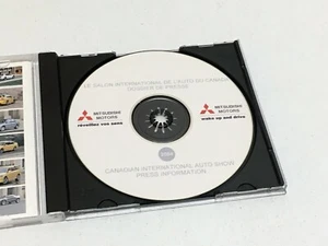 Pressemappe 2004 Mitsubishi Diamante Lancer Evolution gelb LS Ralliart Sportback - Bild 1 von 1