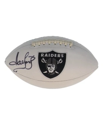 Fútbol americano con logotipo de los Raiders firmado por Howie (Beckett) Foto 1 de 2