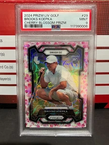 Panini Prizm LIV 2024 Golf Brooks Koepka Cherry Blossom RC #/27 PSA 9 como nuevo #29 - Imagen 1 de 2