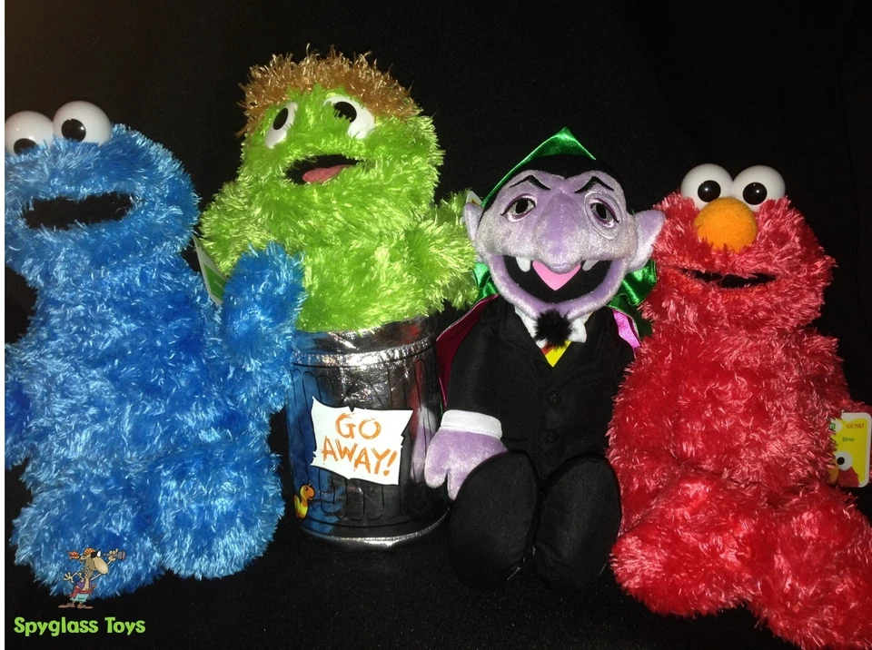 Sesame Street 12" plush set, Cookie Monster, Elmo, Oscar the Grouch & the Count - Image 1 of 1