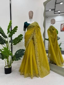Presentamos lo último sari de seda crujiente con blusa verde para uso de recepción - Imagen 1 de 9