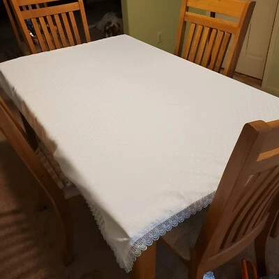 White Fabric Tablecloth Rectangular 62” X 50” with Light Blue Lace Trim - Image 1 of 4