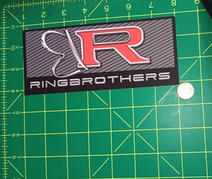 Ringbrothers Adesivo Decalcomania Logo Auto Nero Fibra di Carbonio 4x2 Hot Rod Emblema - Foto 1 di 1