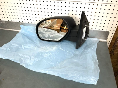 Espejo retrovisor de puerta lateral del conductor GM OEM 25775944 2007-2014 GMC Sierra 2500 HD negro usado Foto 1 de 4