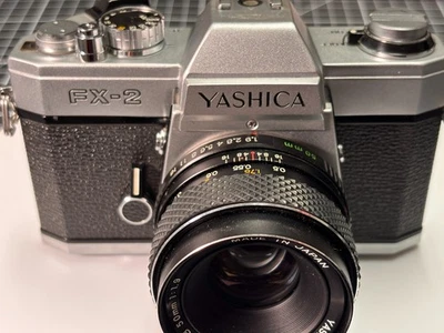 Clean -Yashica FX-2 35mm SLR Film Camera with Yashica 50mm F1.9 lens [Tested] - Image 1 of 4