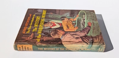 Three Investigators - Mystery of the Whispering Mummy - твердая обложка 1965 - Изображение 1 из 4