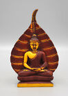 Statue de Bouddha marron méditation feuille de Bodhi