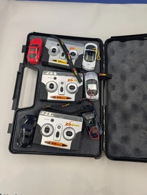 Radio Shack ZipZaps Micro Rc Cars Lot With Case 3 Controllers 3 Cars For Parts - Image 1 of 4