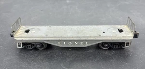 Lionel Metall grau Flachwagen 6111 ohne die Pfähle und Baumstämme schöner Zustand - Bild 1 von 6