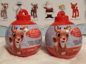 DOS MINI FIGURAS COLECCIONABLES RUDOLPH EL RENO NARIZ ROJA BOLA CIEGA MISTERIO - Imagen 1 de 9