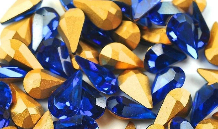 SWAROVSKI ® -Goccia 20 Pz  4300/2-13x7,8 mm. Capri Blue Original Gold Foiled - Immagine 1 di 1