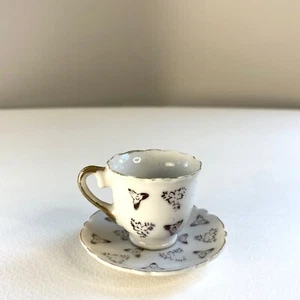 Miniature Porcelain Teacup Saucer Hand Painted Purple Flowers Gold Trim Japan - Picture 1 of 4