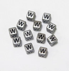 Cuentas metálicas plateadas del alfabeto de 6 mm letra negra "W" 100 piezas - Imagen 1 de 1