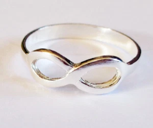 ANELLO SIMBOLO 'INFINITO' ARGENTO STERLING 925 MASSICCIO - Foto 1 di 3