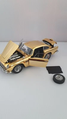 MODELO DANBURY COMO NUEVO ASTON MARTIN DB5 JAMES BOND CHAPADO EN ORO EN CAJA CON PAPELEO  Foto 1 de 4