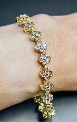Brazalete de piedras circonitas rosa claro relleno de oro con forma de flores preciosas de alta calidad Foto 1 de 4