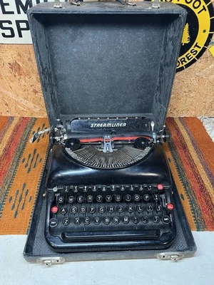 Máquina de escribir Remington Rand Streamliner vintage con estuche Foto 1 de 4