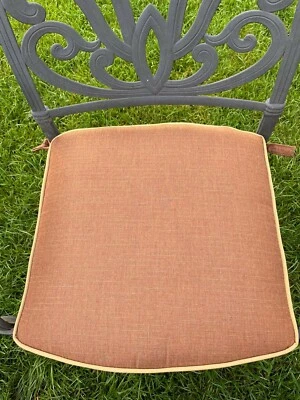 Never Used combo of 2 - 19”x19” outdoor cushions. Reddish brown with tan cording - Image 1 of 4