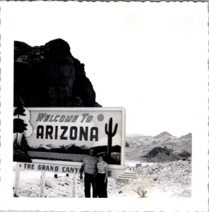 Real Photo Couple Posing in front of Welcome To Arizona Grand Canyon 1950s - Picture 1 of 2