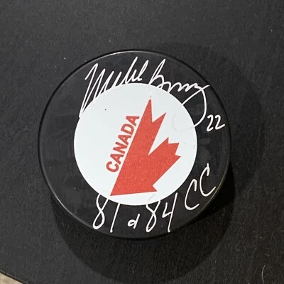 DISCO DE HOCKEY FIRMADO POR LOS ISLEÑOS DE NUEVA YORK DE MIKE BOSSY SIN INSCRIPCIONES CERTIFICADO DE AUTENTICIDAD JSA Foto 1 de 3