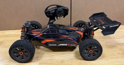 Traxxas Jato ® 4 x 4 VXL 1/8 бесщеточный электрический гоночный багги оранжевый, много дополнений - Изображение 1 из 4