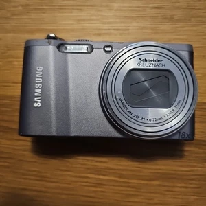 Digitalkamera Samsung WB700 Silber Leichte Kratzer Getestet Funktioniert Kamera - Bild 1 von 7
