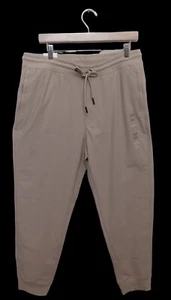 Pantaloni jogger Calvin Klein uomo slim fit elasticizzati traspiranti sport tecnici zip tasca XL - Foto 1 di 8
